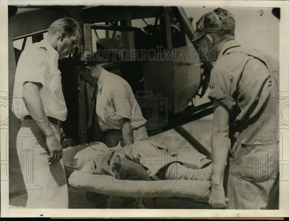 1930 Press Photo Injured Removed from Rescue Plane after Injuries On Mt. Whitney - Historic Images