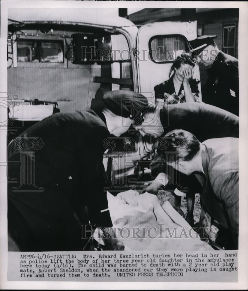 1952 Press Photo Mrs Edward Kauzlarich hides her face - nef01192 - Historic Images