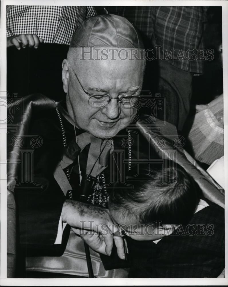 1965 Press Photo New York Francis Cardinal Spellman has ring kissed by child NYC - Historic Images