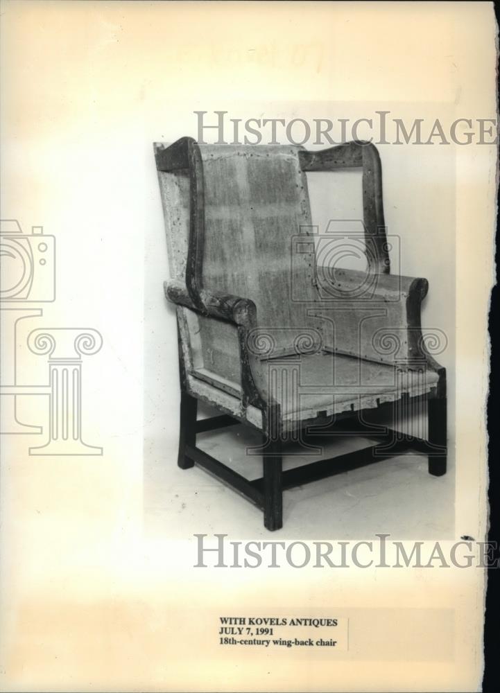 1991 Press Photo 18th century wing back chair with Kovel&#39;s Antiques  - cvb68134 - Historic Images