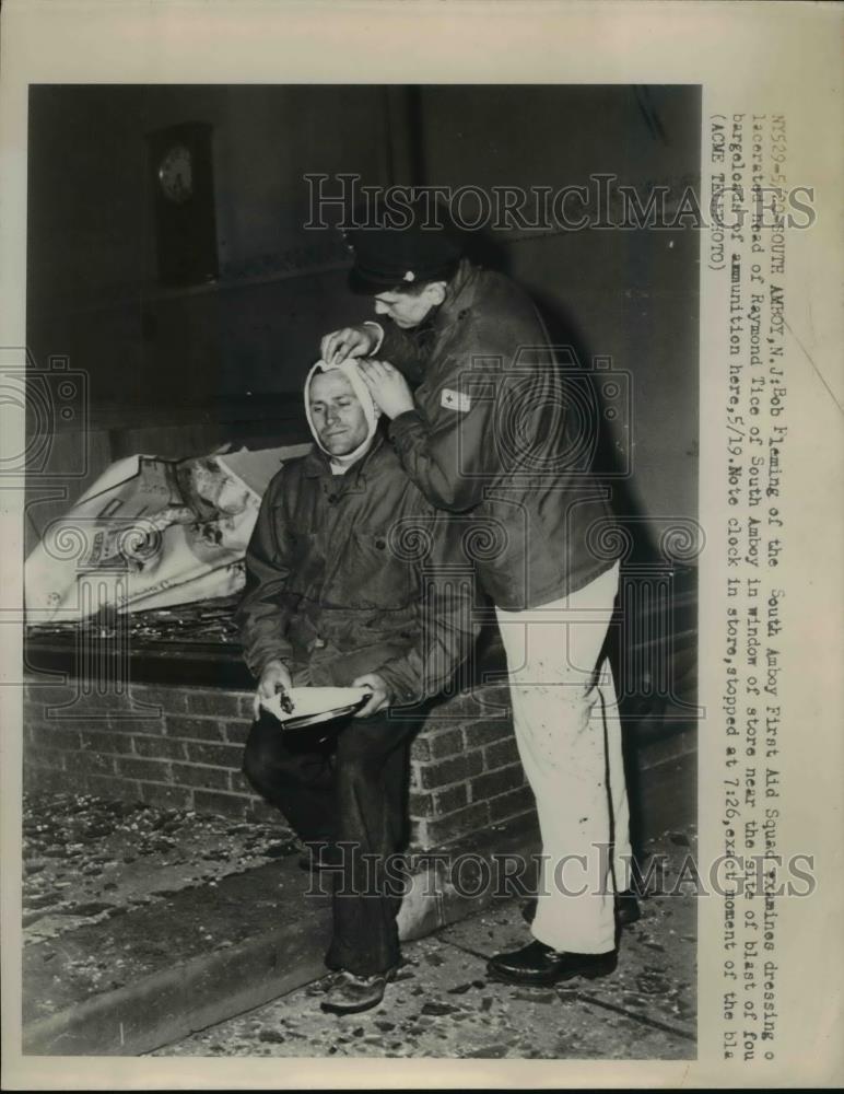 1950 Press Photo Bob Fleming examines dressing of Raymond Tice - nef03495 - Historic Images