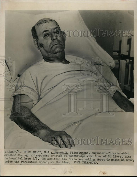 1951 Press Photo Train engineer John Fitzsimmons in hospital after accident - Historic Images