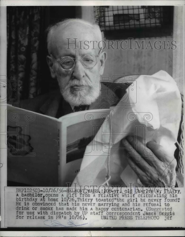 1956 Press Photo Charles Thierry opens gifts at home celebrating 106th birthday - Historic Images