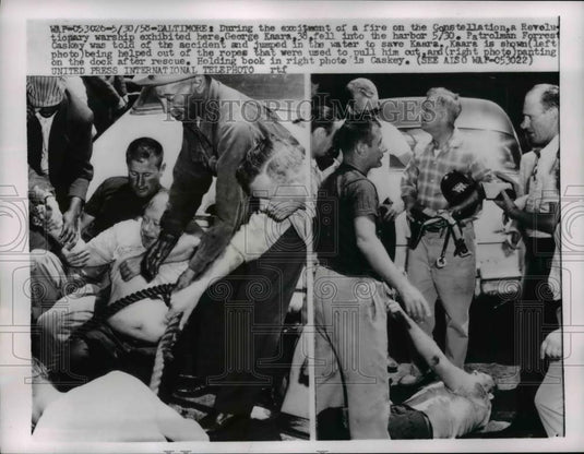 1958 Press Photo George Kaara rescued after falling into harbor during fire - Historic Images