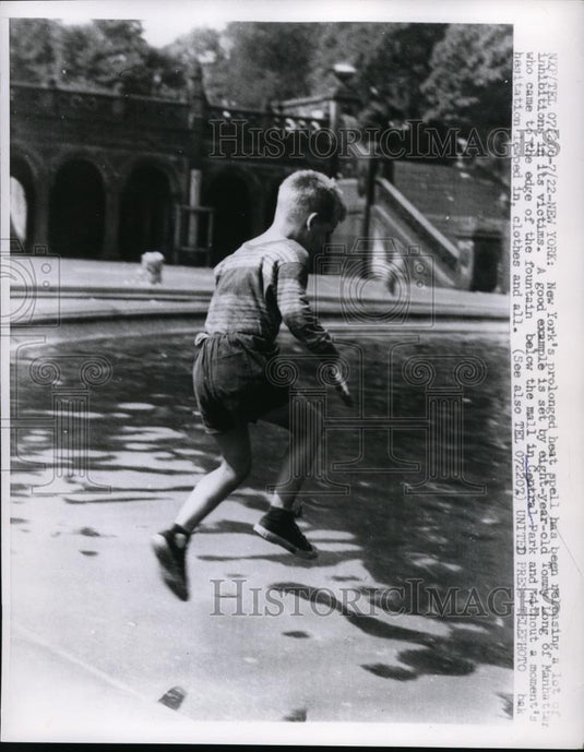 1957 Press Photo New York Tommy Long at fountain in Central Park NYC - neny02144 - Historic Images