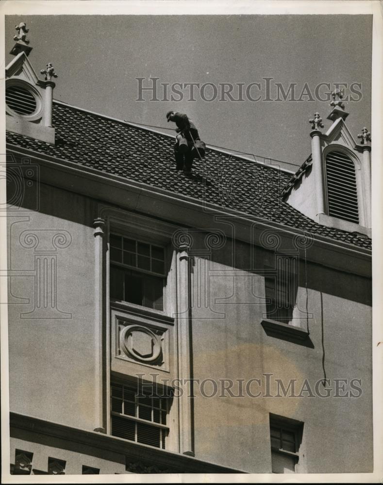 1956 Press Photo Repairman Ralph Clark Heads For Gutter On A Roof - nee94615 - Historic Images