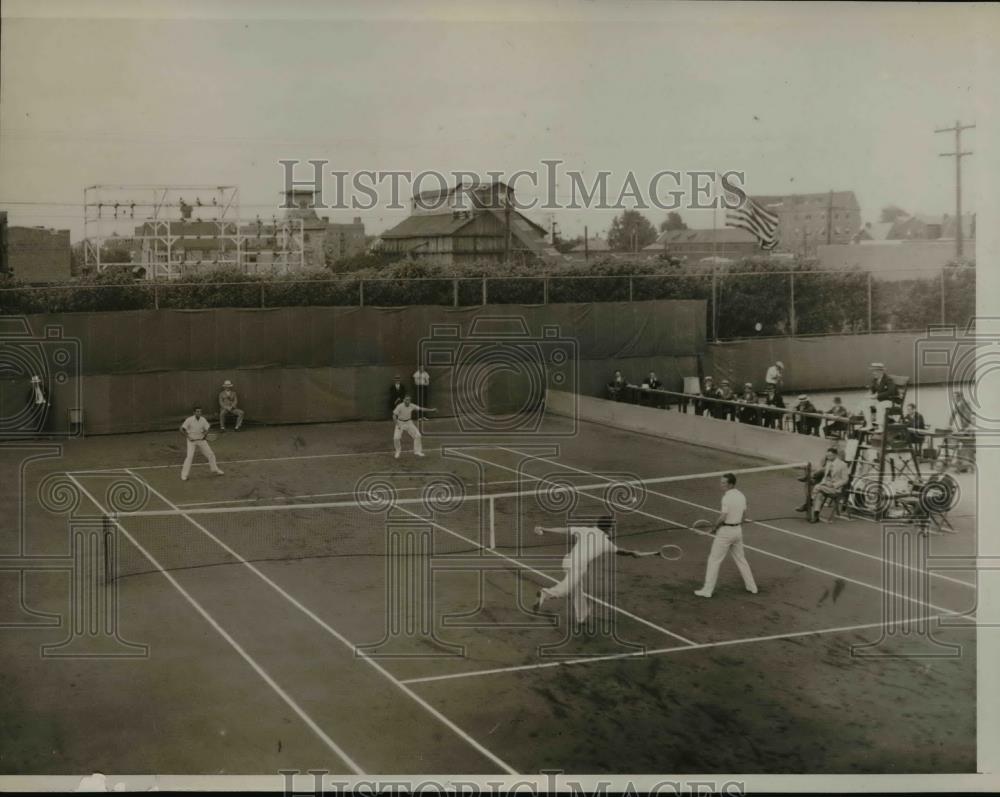 1932 Press Photo Four men in a doubles tennis match on the courts - net16860 - Historic Images