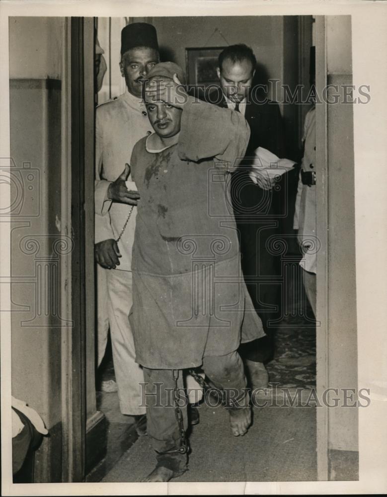 1952 Press Photo Moly Lamloum being taken to prison cell - nef08561 - Historic Images