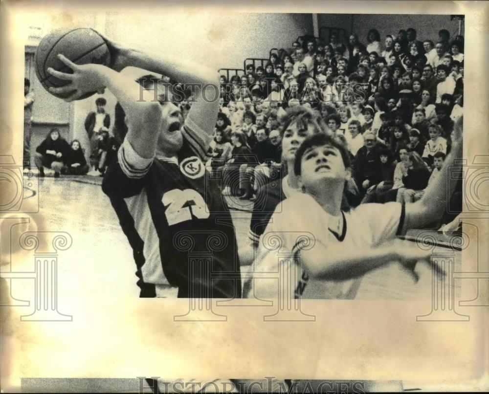 Press Photo Kristan Colburg of Christ the King pulls down a rebound. - Historic Images