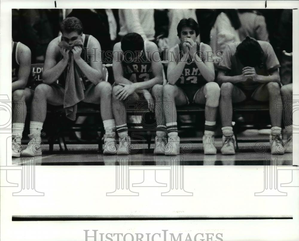 1987 Press Photo Parma players sit on the bench dejected after losing. - Historic Images