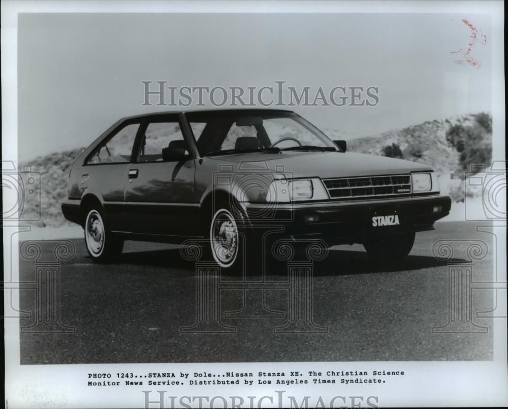 Press Photo Nissa Stanza XE. Automobiles. - cvb68231 - Historic Images