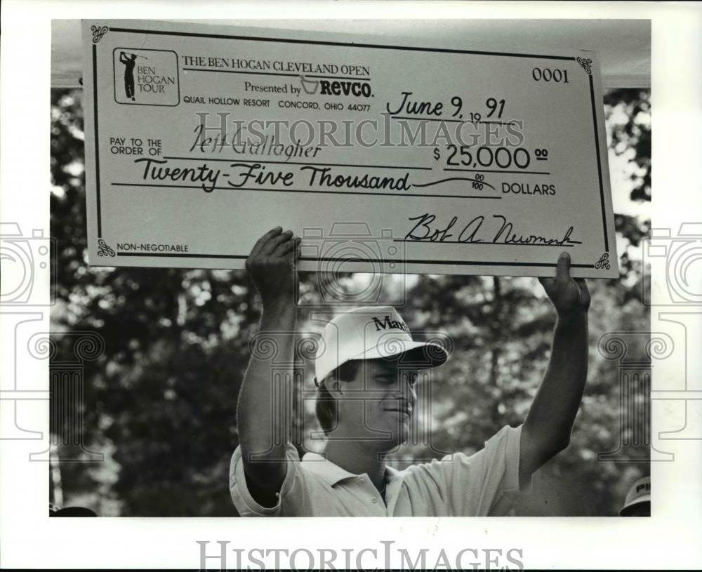 1991 Press Photo Jeff Gallagher Holds Up his Winnings - cvb69493 - Historic Images