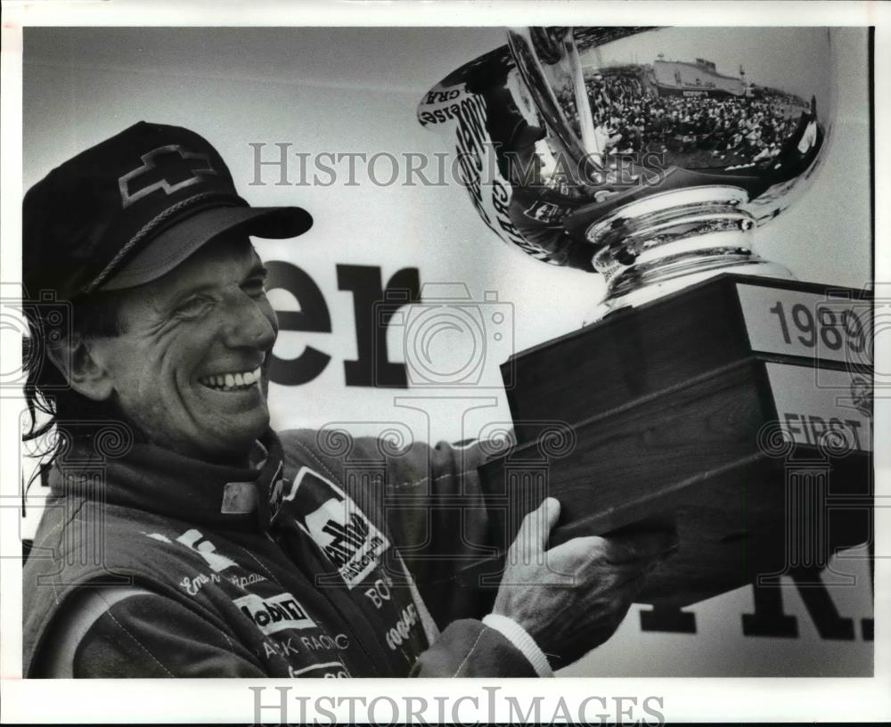 1989 Press Photo Emerson Fittipaldi with trophy at Bud Grand Prix - cvb69754 - Historic Images