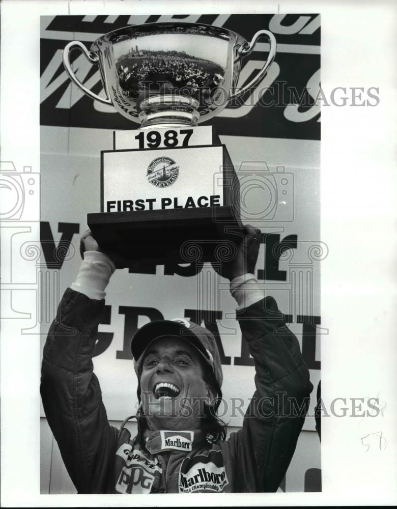 Press Photo Emerson Fittipald with winners trophy - cvb70533 - Historic Images