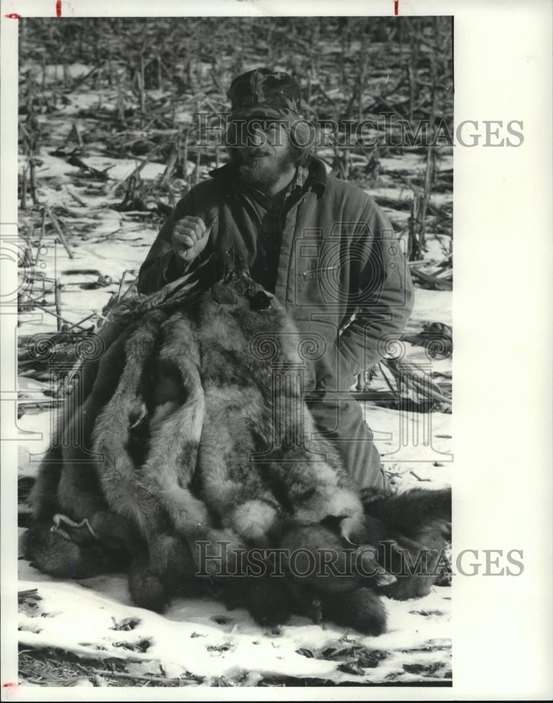 Press Photo Trapper with his catch - cvb72625 - Historic Images