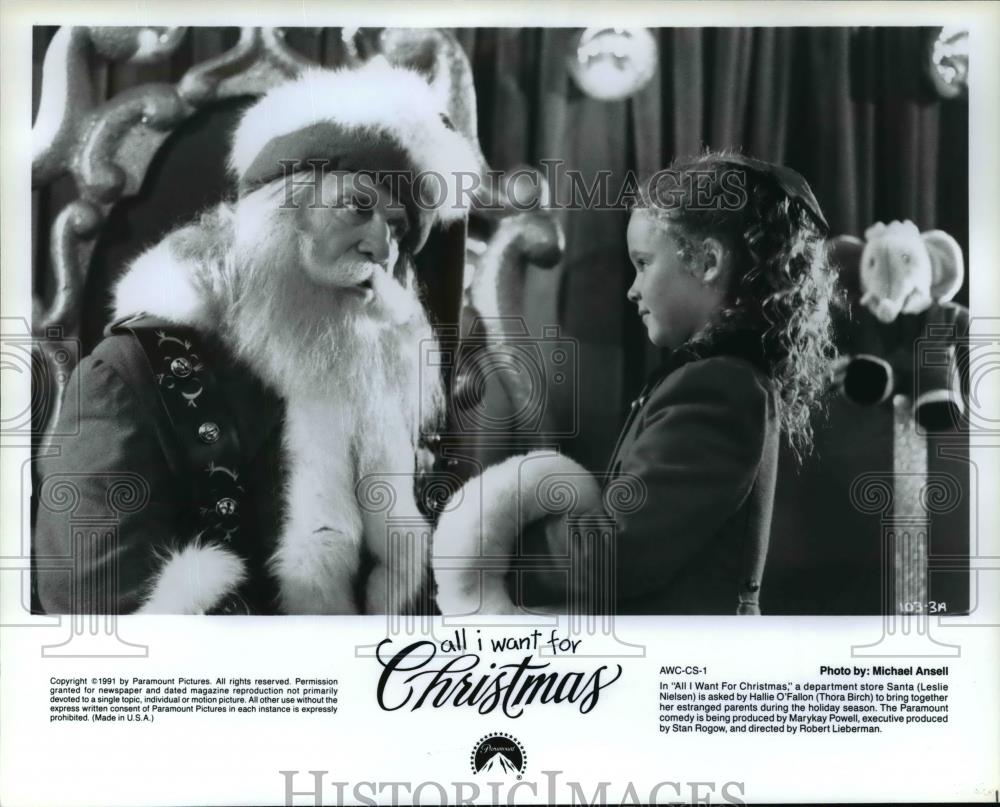 1991 Press Photo All I Want For Christmas-Thora Birch and Leslie Nielsen - Historic Images