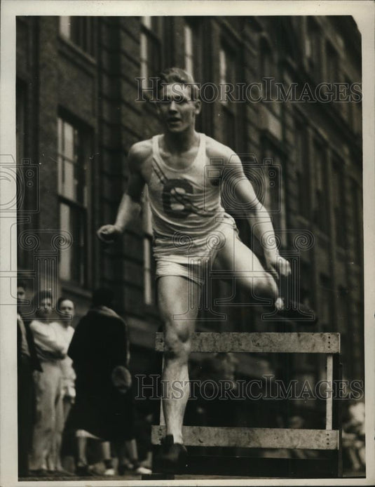 1936 Press Photo Collinwood High School's Paul Lundblad during hurdles event - Historic Images