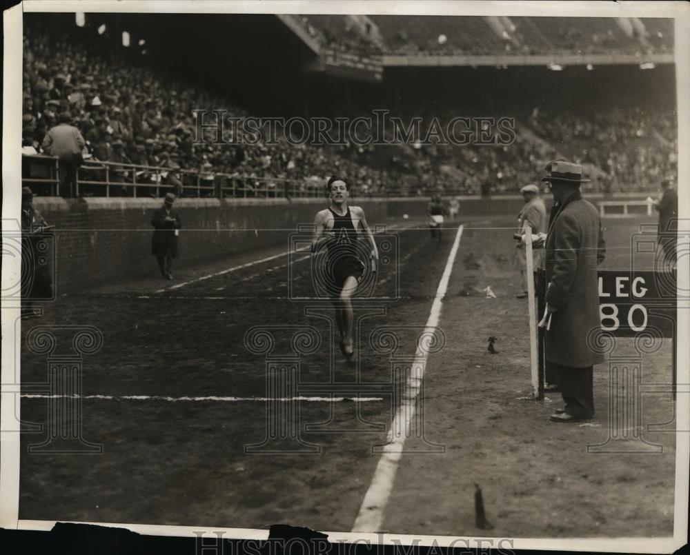 1931 Press Photo Penn Relays track meet sprinters in a dash for tape - net03280 - Historic Images