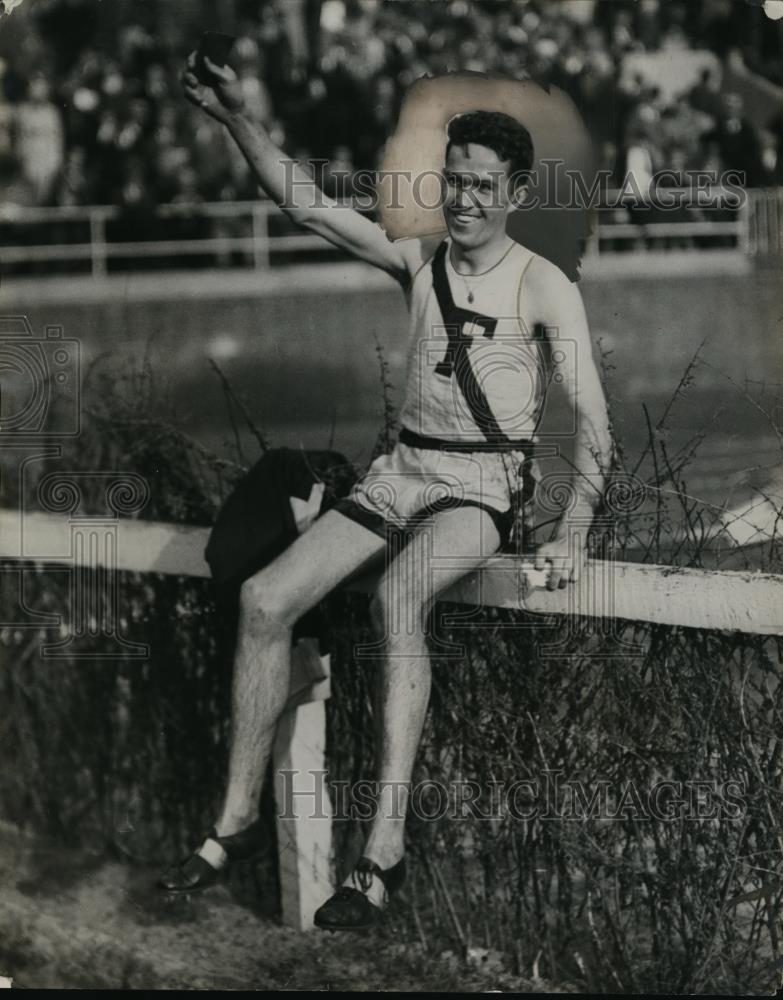 1933 Press Photo Track runner Joe McClusky sits on sidelines - net03735 - Historic Images