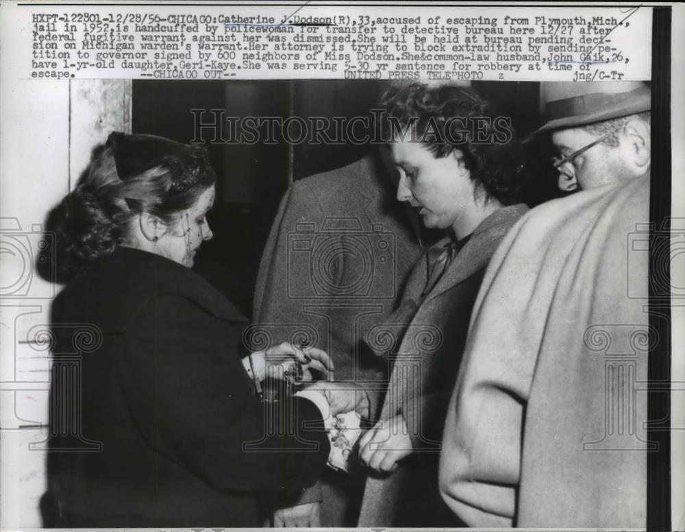 1956 Press Photo J. Dodson Handcuffed By Police For Transfer To Detective Bureau - Historic Images