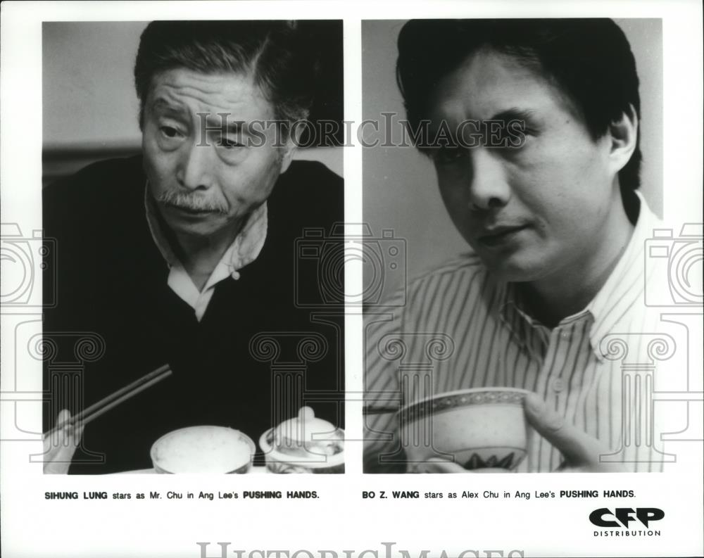 Press Photo Sihung Lung and Bo Z. Wang star in "Pushing Hands." - cvb76365 - Historic Images