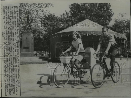 1967 Press Photo Steve Grady, Football Player, and Girlfriend Ride Bikes - Historic Images