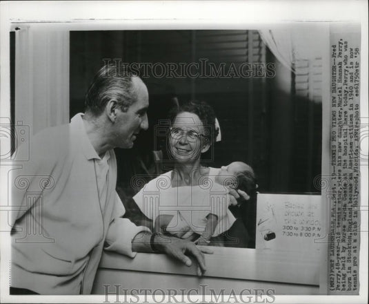 1958 Press Photo Fred Perry views his daughter at the hospital. - cvb76571 - Historic Images