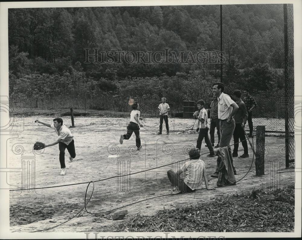 1965 Press Photo John D. Rockefeller IV, Working on a new Little League field. - Historic Images