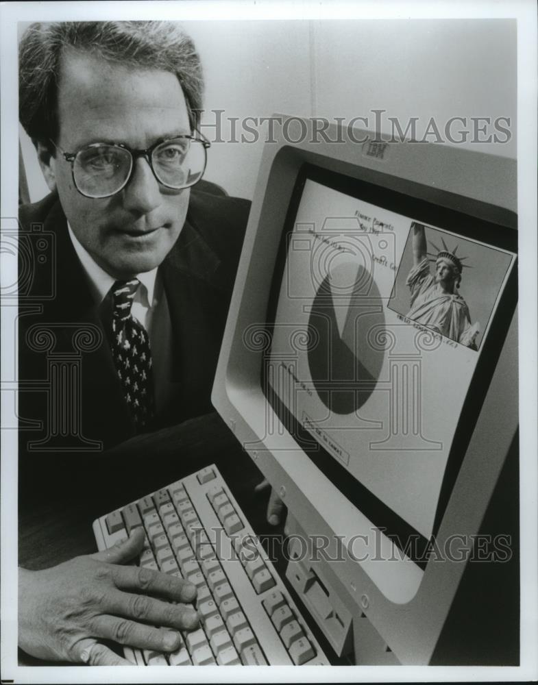 1993 Press Photo Skip Gladfelter IBM Marketing Manager looks at PS/1 computer - Historic Images