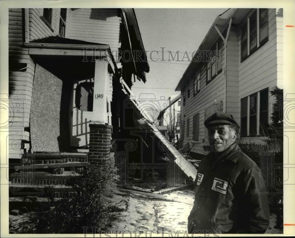 1979 Press Photo Joe Massey stands in front of his damaged house - cva33972 - Historic Images