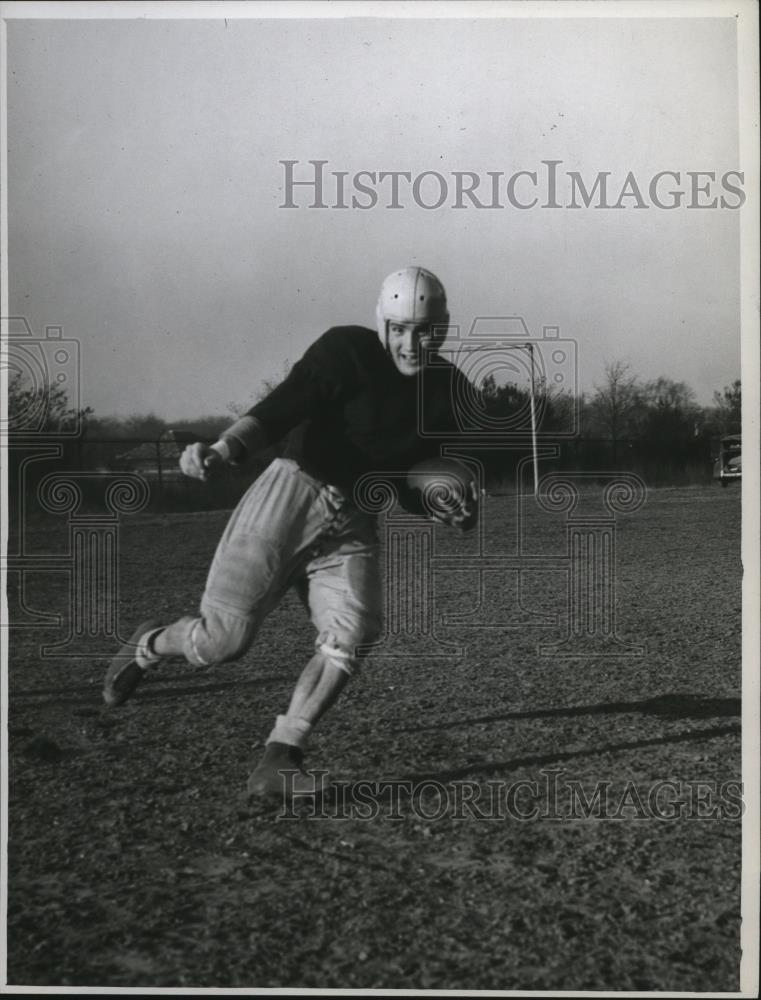 1946 Press Photo Earl Gentile, Cathedral Latin football player during practice - Historic Images