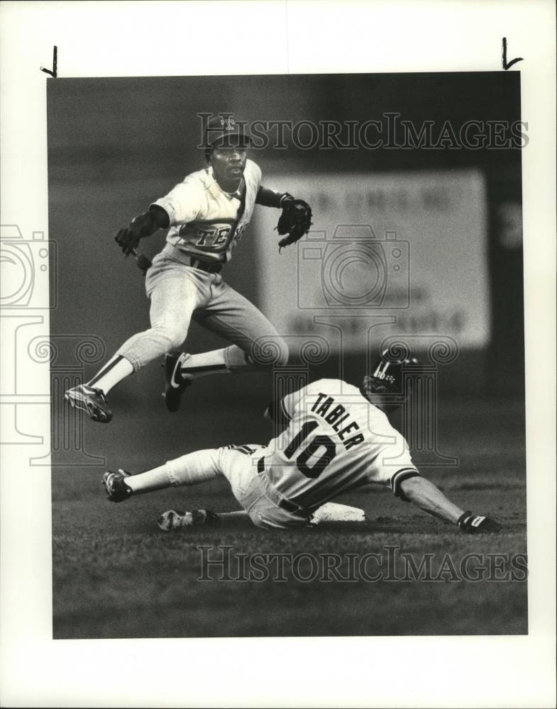 Press Photo Brook Jacoby hits the base as Pat Tabler was tagged out. - Historic Images