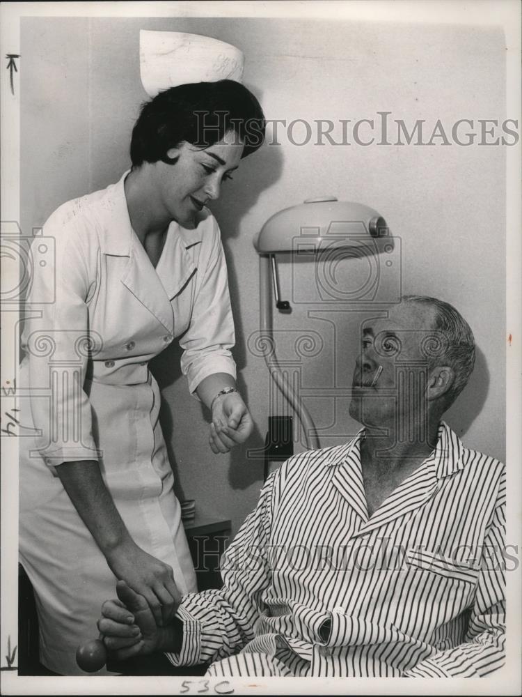 1964 Press Photo Miss Mary Jo Cronmiller checks Birdil Tibbeth - cvb77314 - Historic Images