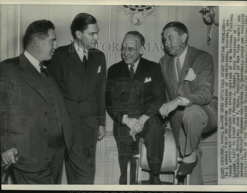 1943 Wire Photo Football officials confer during the Spring meeting in Chicago - Historic Images