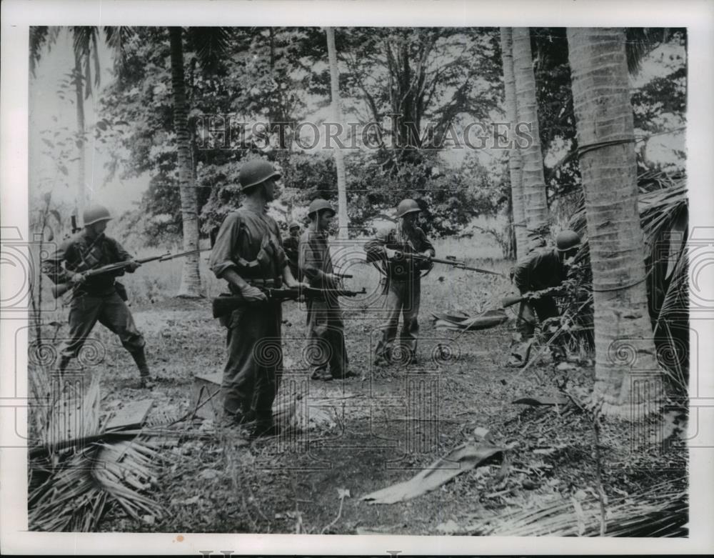 1962 Wire Photo U.S. Marines have rifles ready as they search for Japanese snipe - Historic Images