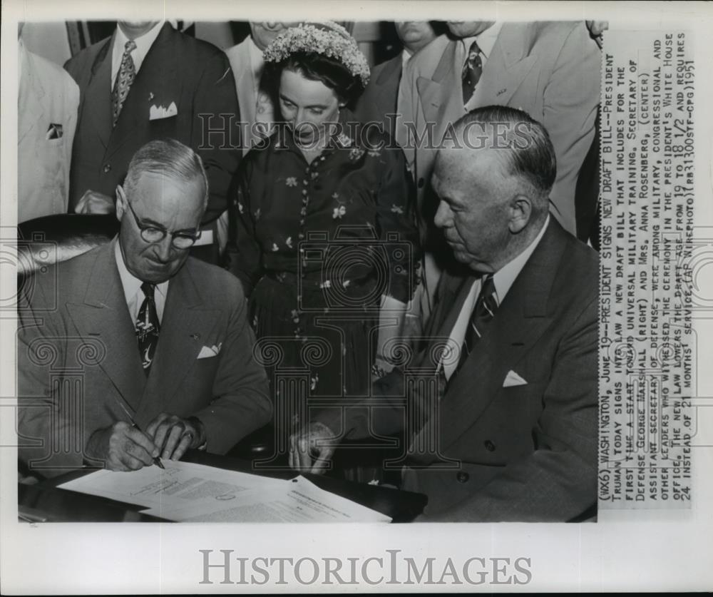 1951 Wire Photo President Harry S Truman signs into law the new Draft Bill - Historic Images