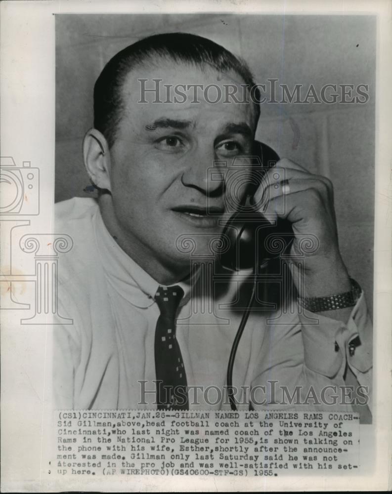 1955 Wire Photo Sid Gillman talking on the phone with his wife, Esther - Historic Images