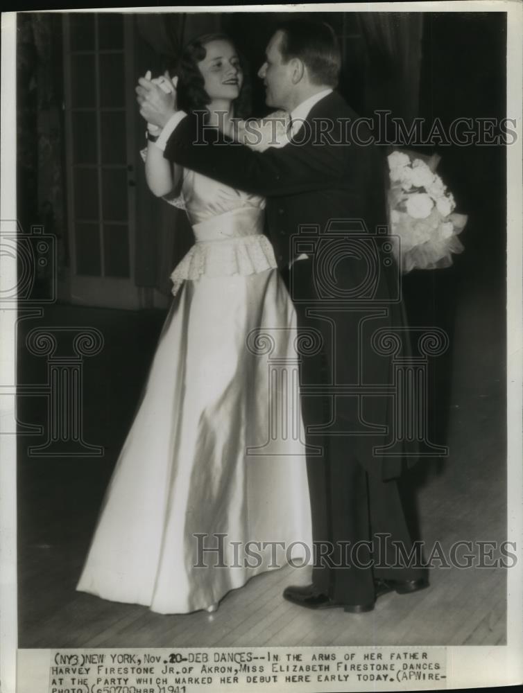 1941 Wire Photo Harvey Firestone Jr dances with daughter during her debut - Historic Images