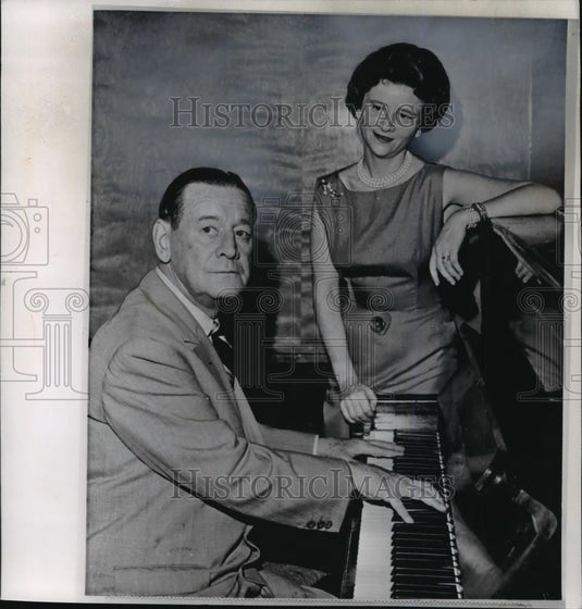 1961 Wire Photo Harvey Firestone, Jr. plays piano as Mrs. Willis looks on - Historic Images
