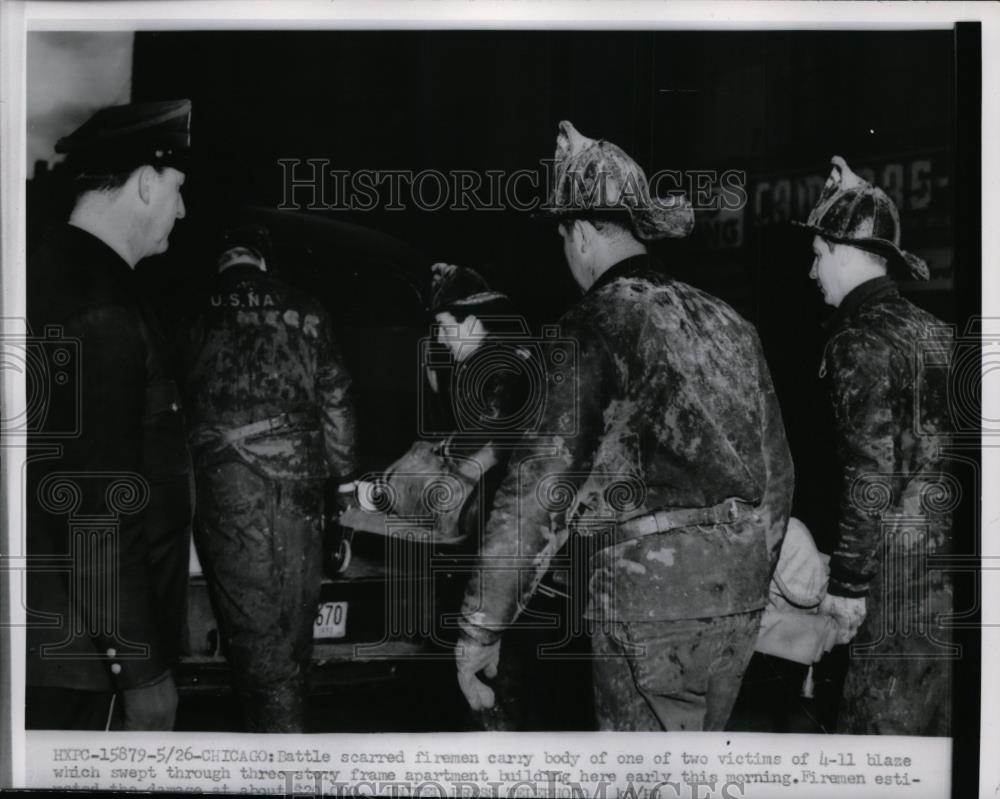 1952 Press Photo Firemen Carry Body of One of Two Victims of 4-11 Apartment Fire - Historic Images