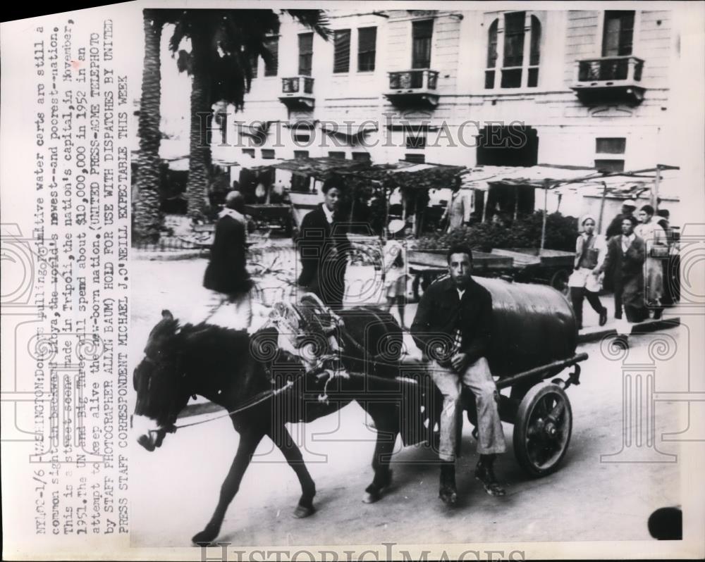 1952 Press Photo Donkey Pulling Water Cart in Tripoli, Libya - nef15941 - Historic Images