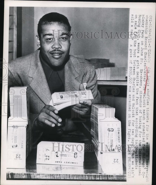 1949 Press Photo Boxer Joe Louis & tickets for his bout vs Ezzard Charles - Historic Images