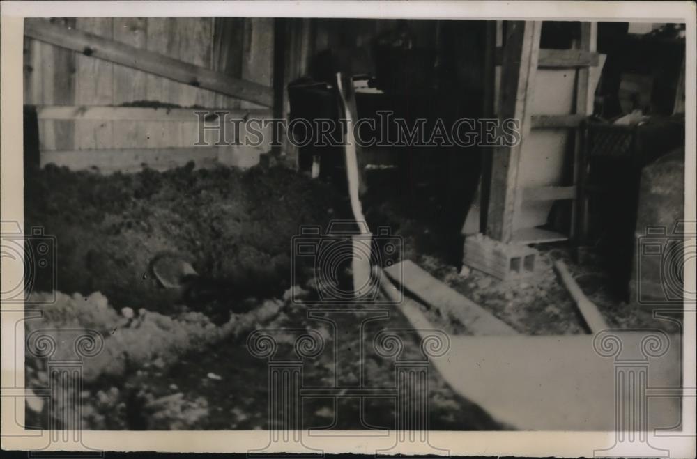 1937 Press Photo Authorities Investigating This 3 x 6-Foot Hole in Rev's Garage - Historic Images