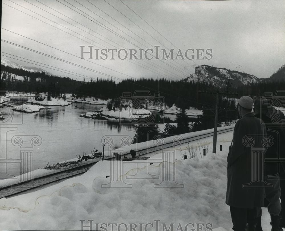 1956 Press Photo Men enjoying a beautiful river view during winter - spx10811 - Historic Images