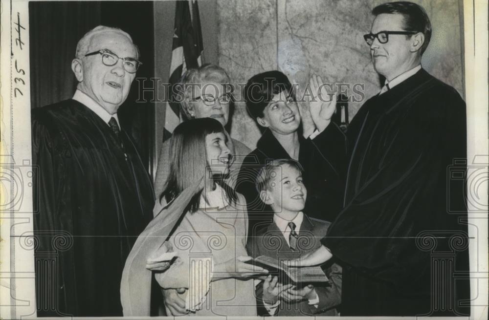 1968 Press Photo Paul M. Herbert, Retired Supreme Court Justice swears in his so - Historic Images