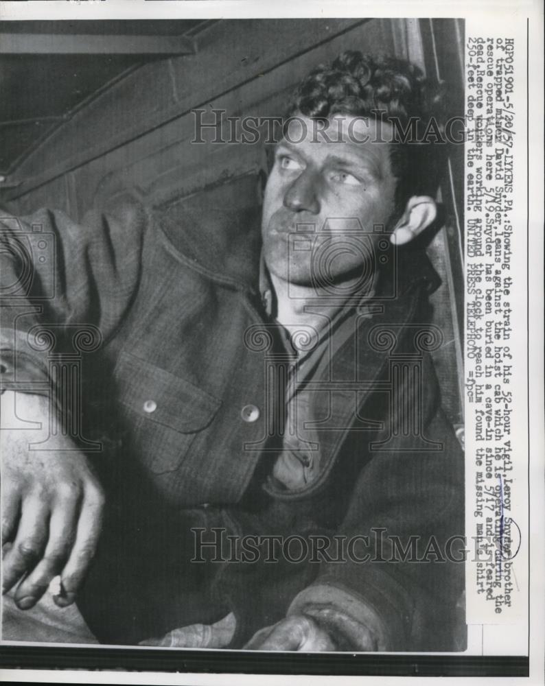 1957 Press Photo Leroy Snyder Operating Hoist Cab During Rescue Operations 5/19 - Historic Images