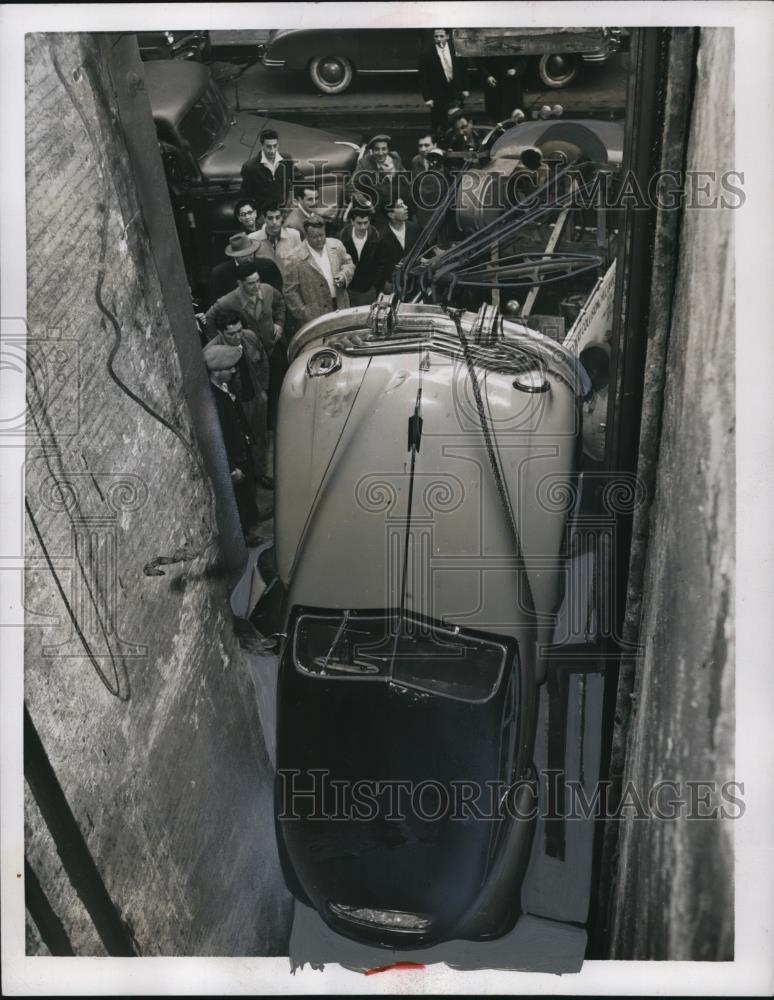 1954 Press Photo Car Fallen off Elevator at New York Rental Garage - nef43932 - Historic Images