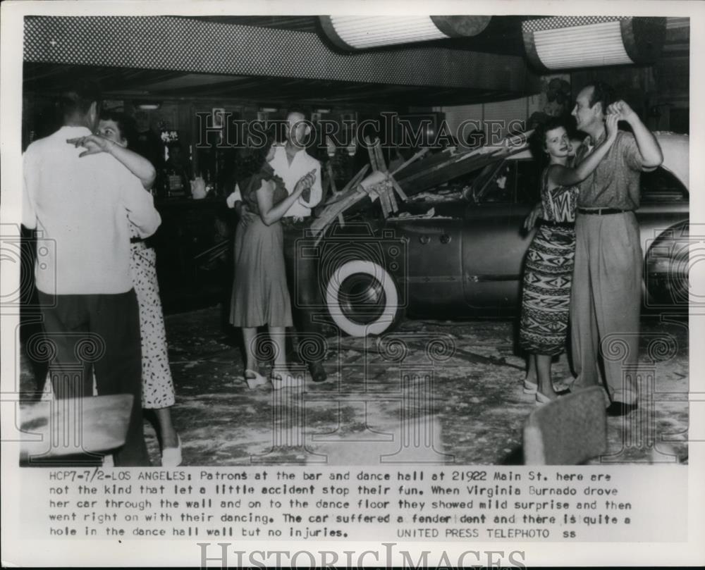 1954 Press Photo Couples Still Dancing after Car Crashed into Bar in Los Angeles - Historic Images