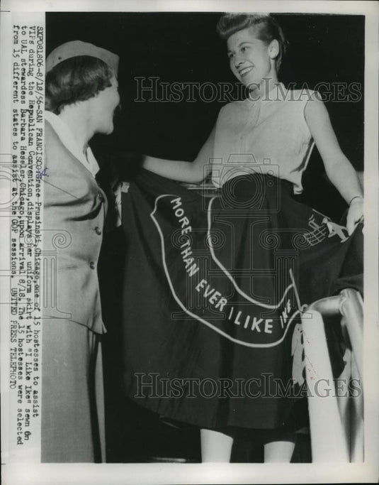 1956 Press Photo Grace Prusinki displays her uniform skirt with "I like Ike" - Historic Images