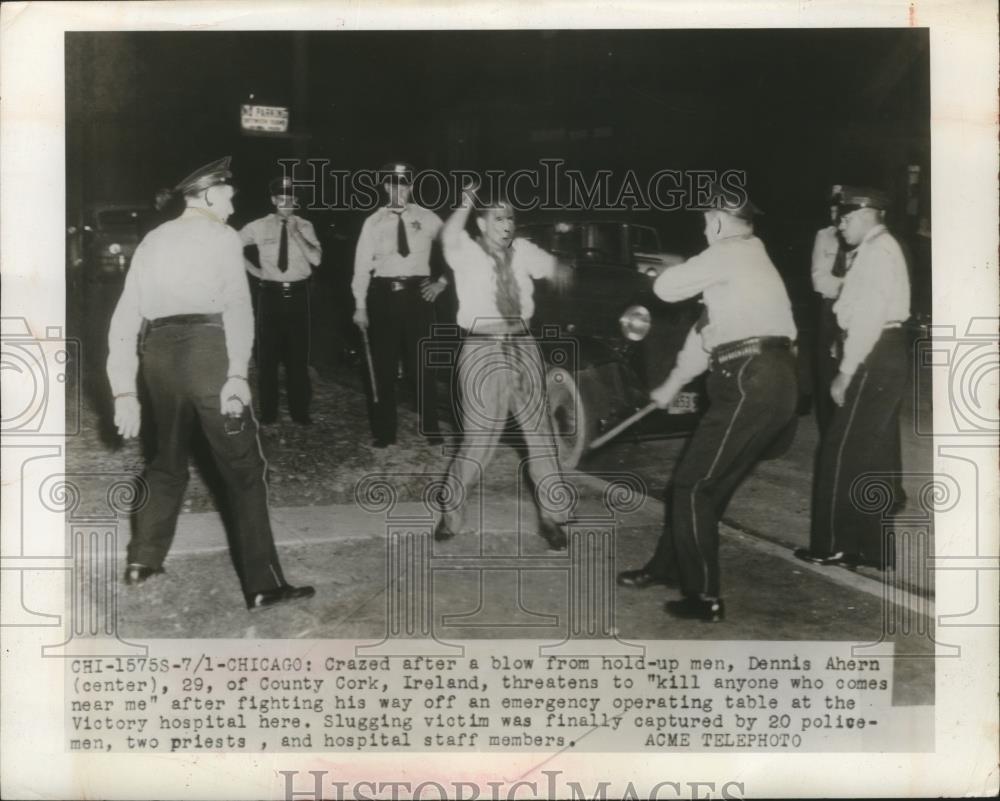 1948 Press Photo Dennis Ahern surrounded by police and threatens to kill - Historic Images